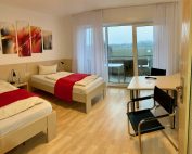Hotel Haus Stallmeister Lippstadt – Günstige Zimmer & Ferienwohnungen mit Komfort: Hotelzimmer mit Balkon